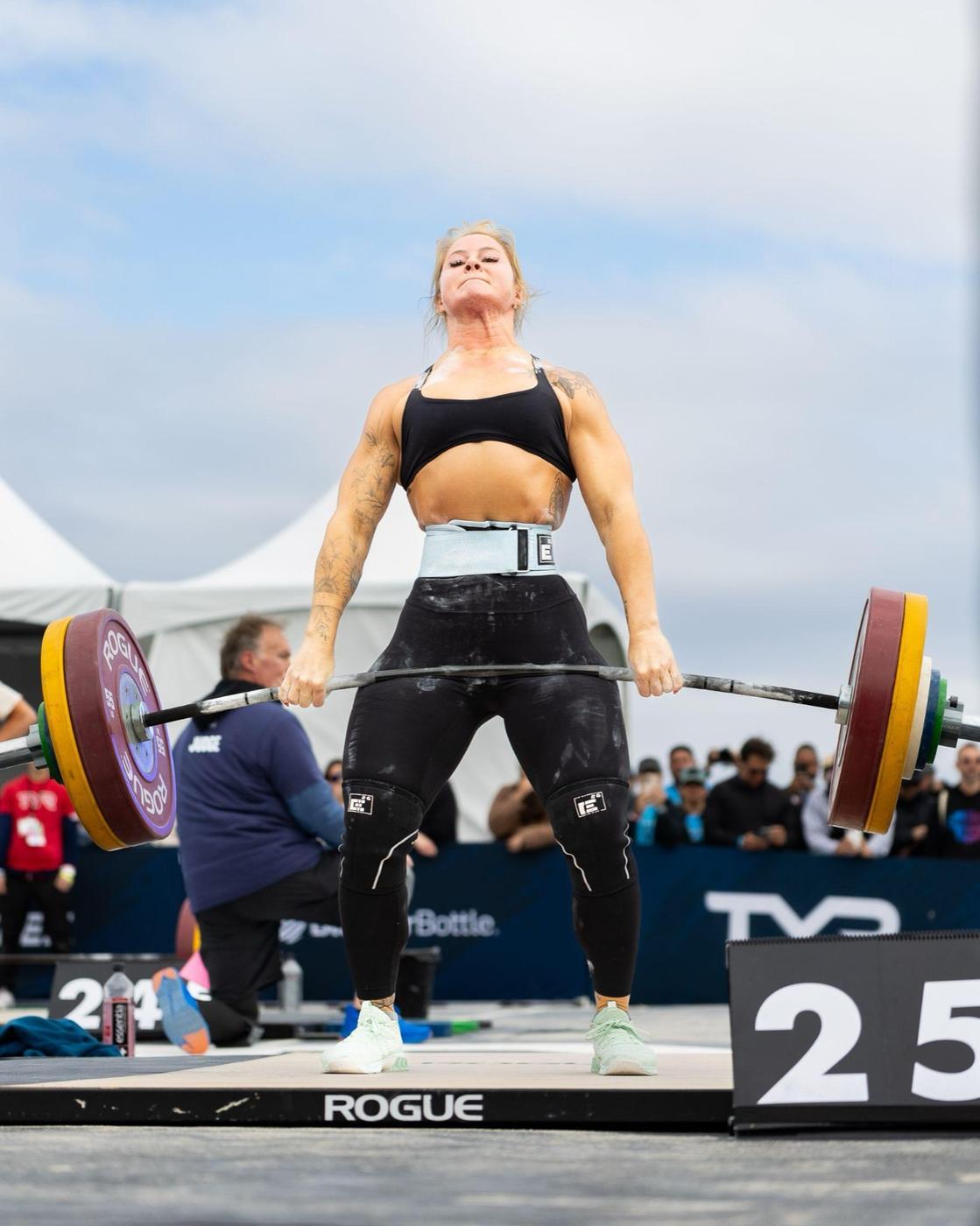 Athlete pulling a loaded barbell